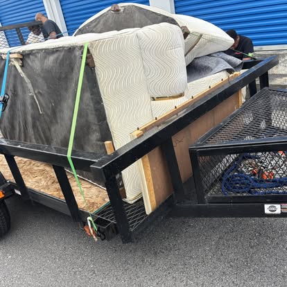 Storage unit cleanout, strapped and loaded